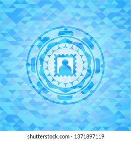 picture icon inside sky blue emblem. Mosaic background