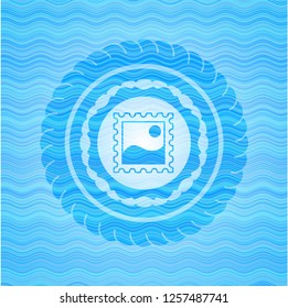 picture icon inside water wave emblem background.