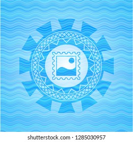 picture icon inside water wave representation style emblem.