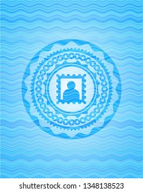 picture icon inside water wave concept badge.