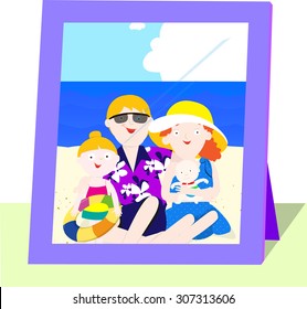 A picture inside a frame.  A family enjoying their vacation at the beach.