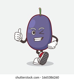 Una foto del personaje de la mascota de Java Plum haciendo gesto de Thumbs