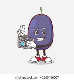 A picture of Java Plum cartoon mascot character as photographer in action with a camera
