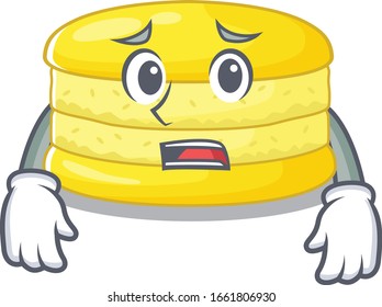 A picture of lemon macaron having an afraid face