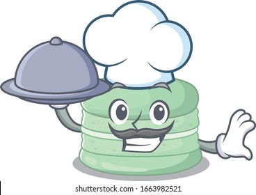 Una imagen del macaron de pistacho como chef sirviendo comida en la bandeja