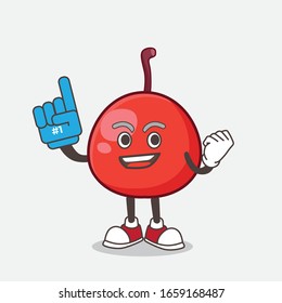 A picture of Red Berry cartoon mascot character holding a Foam finger