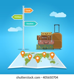 Picture of of suitcases stack with world map and road sign. Vacation and travel concept.