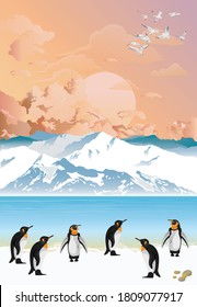 Picturesque Antarctic landscape with ocean and mountains with penguins in foreground set against a dawn or dusk pink sky