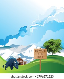 Picturesque rural scene with beware the bull sign on summer mountainous lowland pastures set against a blue cloudy sky