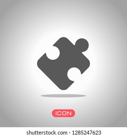 Piece of puzzle, sign of logic, simple icon. Icon under spotlight. Gray background