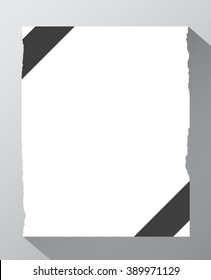 Piece of torn white notebook paper with ribbon on gray background