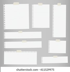 Pieces of cut out white lined notebook paper are stuck on gray background