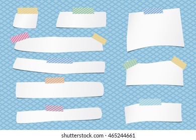 Pieces of cut white note paper are stuck with colorful striped sticky tape on grid pattern