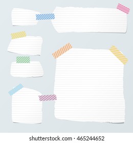 Pieces of cut white ruled note paper are stuck with striped sticky tape on light blue background