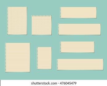 Pieces of cut yellow squared, ruled notebook paper are stuck on blue background