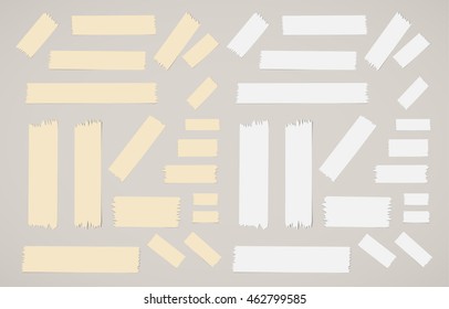 Pieces of different size sticky, masking tapes.