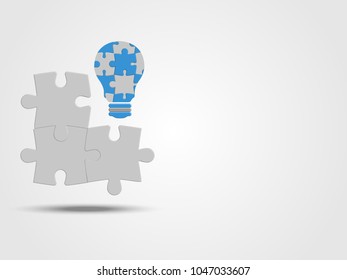 Pieces of jigsaw with the lightbulb represent thinking of new idea and innovation. Technology Background. Abstract background made from puzzle pieces. Concept of engineering and innovation. 