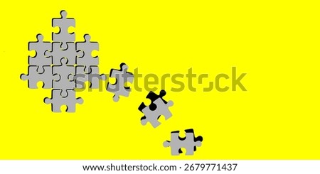 Pieces of jigsaw puzzle on yellow background. isolated background