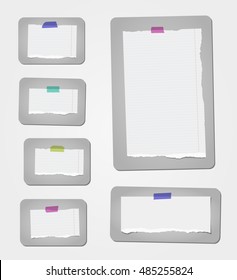 Pieces of ripped white ruled note paper are stuck on grey rectangles