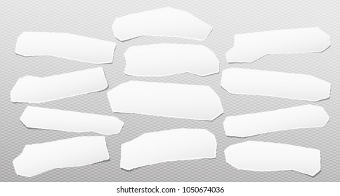 Pieces of torn white note, notebook paper strips stuck on gray squared background