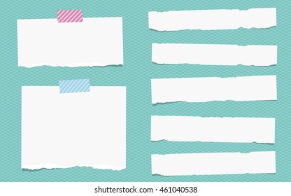 Pieces of torn white note paper are stuck on squared turquoise pattern