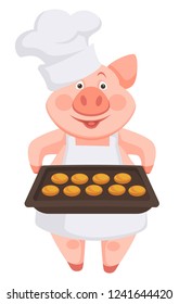 Pig chef wearing hat and apron, holding baking sheet
