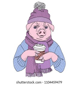 Pig drinks hot coffee from a paper cup. The pig is dressed in a warm knitted scarf and hat.