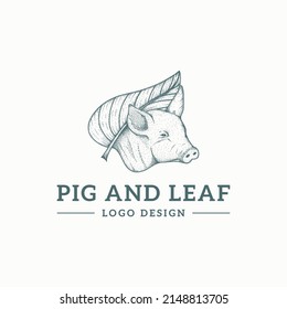 PIG HEAD AND LEAVES LOGO DESIGN