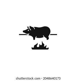 Pig roasted on a barbecue spit vector illustration.