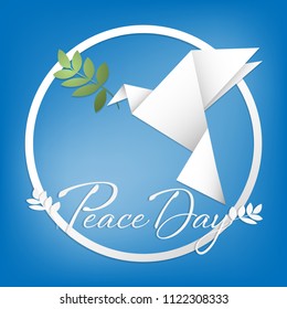 Pigeon with an olive branch paper origami illustration on blue background. Origami peace dove for International Day of Peace concept.