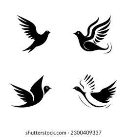 Pigeon silhouettes. Vector flying doves on a white background. Four doves. Set logo