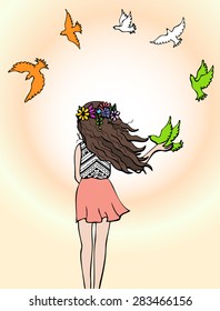 Pigeons and girl - fly birds on bright sunny day with shining sunshine rays. Girl releasing pigeon for freedom
