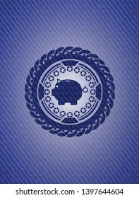 piggy bank icon inside denim background