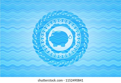 piggy bank icon inside sky blue water wave style badge.