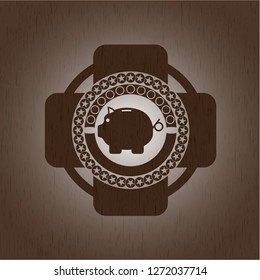 piggy bank icon inside wood badge or emblem