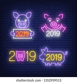 Pigs, year two thousand nineteen neon signs set. Year of the Pig, New Year Day design. Night bright neon sign, colorful billboard, light banner. Vector illustration in neon style.