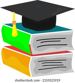 pile of 2 books with graduation caps on them. graduation caps placed on books.