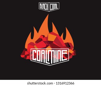 Pile of burning coal charcoal, graphite coal,lump of coal with flames isolated on black