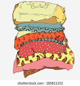 Pile of colorful hand drawn pillows
