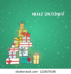 Pile of gift boxes. Christmas card on green background with snowflakes.
