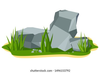 Pile of large gray boulder rock stones lie on a summer lawn on green grass.