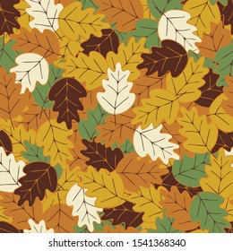 Pile of oak leaves, autumn colors. Vector seamless pattern.