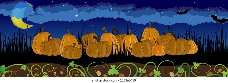 Pile of pumpkins in the tall grass. Halloween night scene