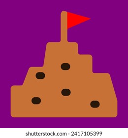  A pile of sand forms a castle and flag