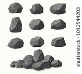 Pile of  stones, graphite coal. 
