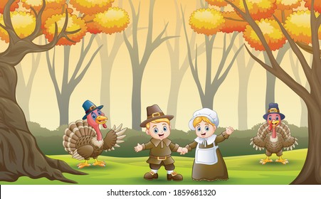 Pilgrim couple with turkey birds in the forest