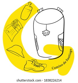 Pilgrim s backpack and yellow arrow. Panama hat, backpack, pilgrim passport, boots, water. Translation of the Camino de Santiago St. James s Path - A popular walking route with ancient roots