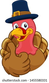 Pilgrim Turkey Thanksgiving bird animal cartoon character wearing a pilgrims hat giving a thumbs up