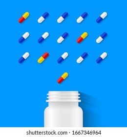 Pill bottle and carefully assorted pills on blue background. Pharmaceutical medicine and medical treatment concept, scattered arrangement and top view..