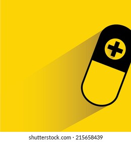 pill, capsule on yellow background